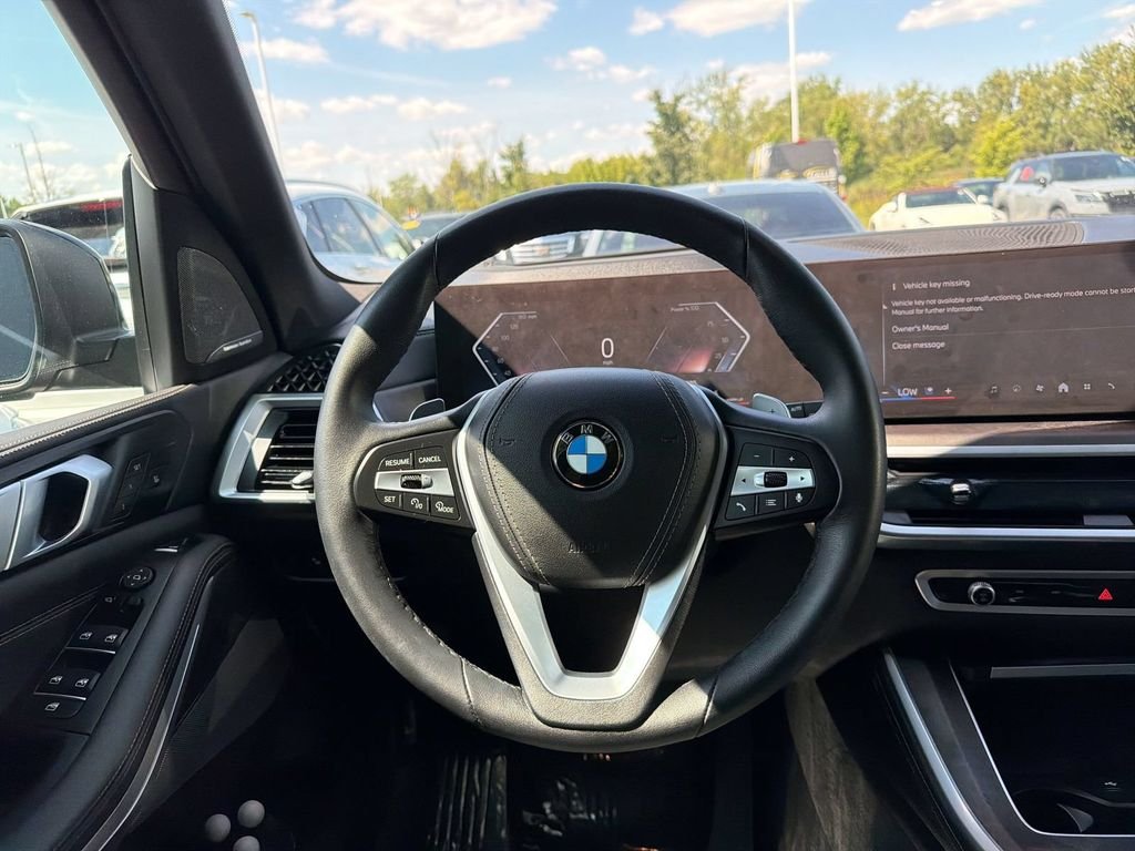 Certified Used 2025 Black Sapphire Metallic BMW xDrive40i image 15