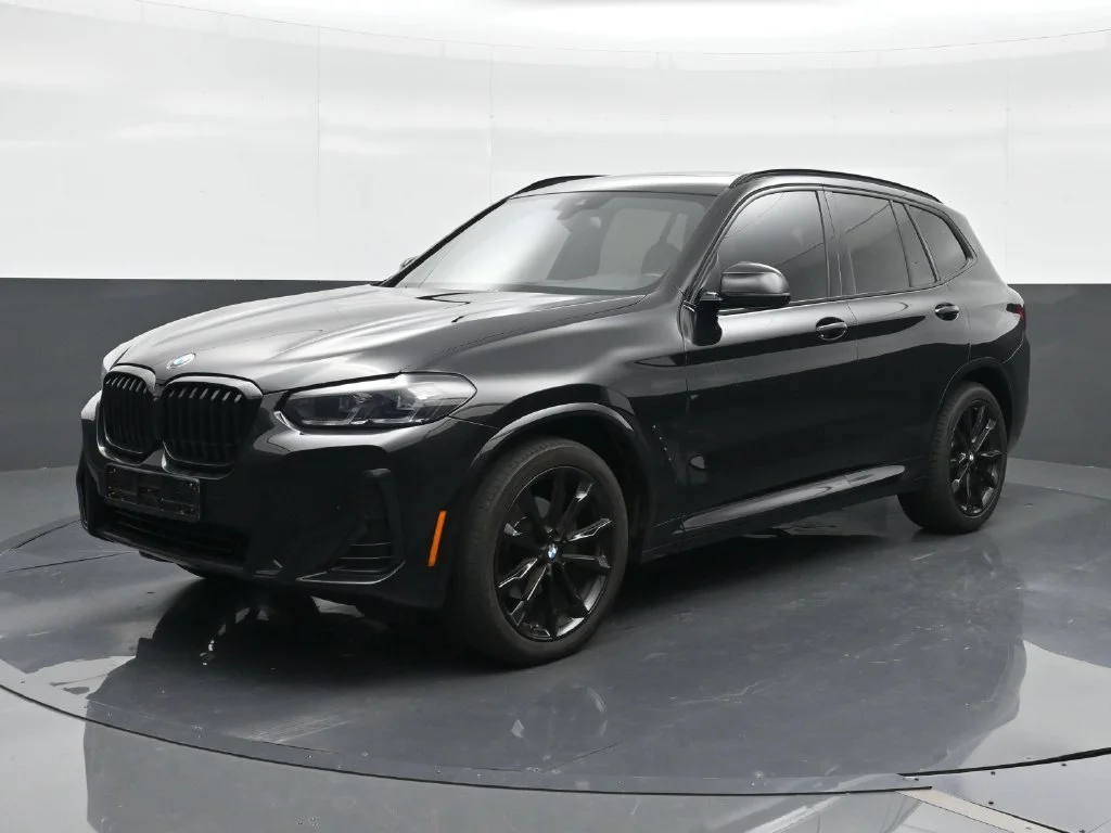Used 2023 Black BMW sDrive30i image 1