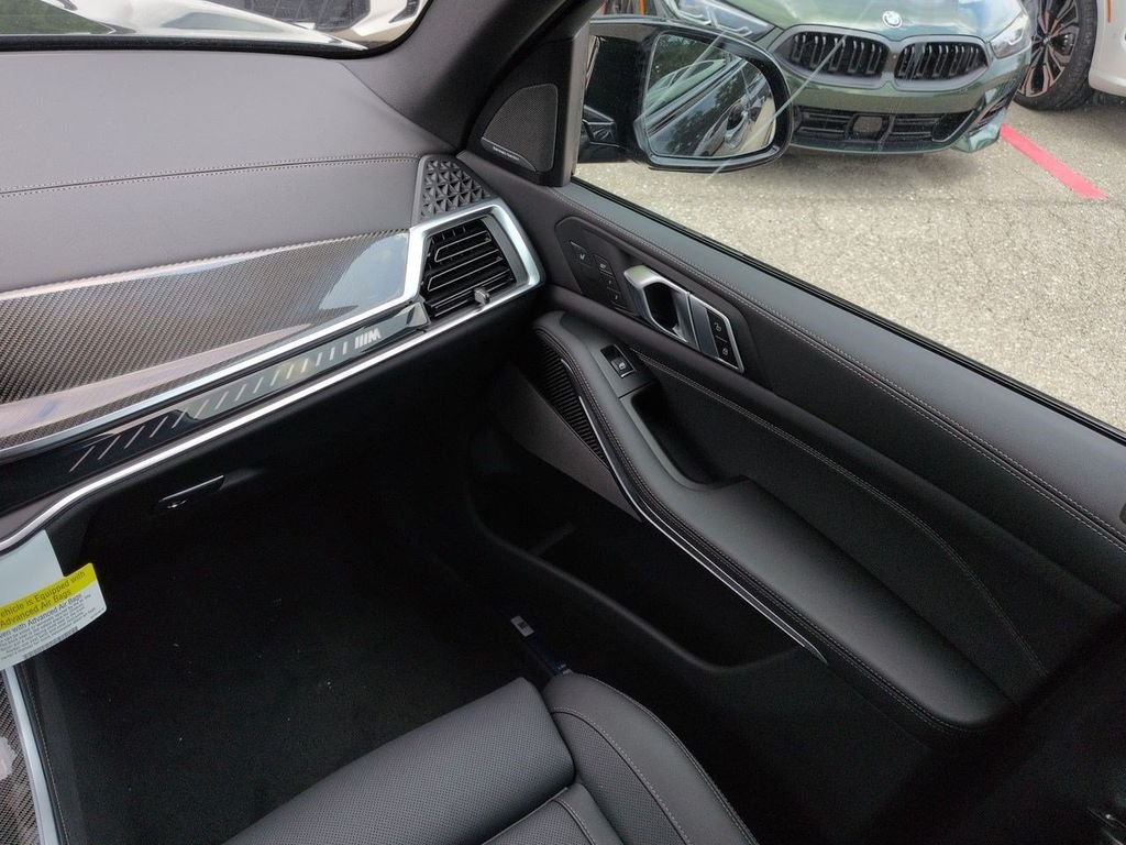 New 2026 Black Sapphire Metallic BMW M60i image 17