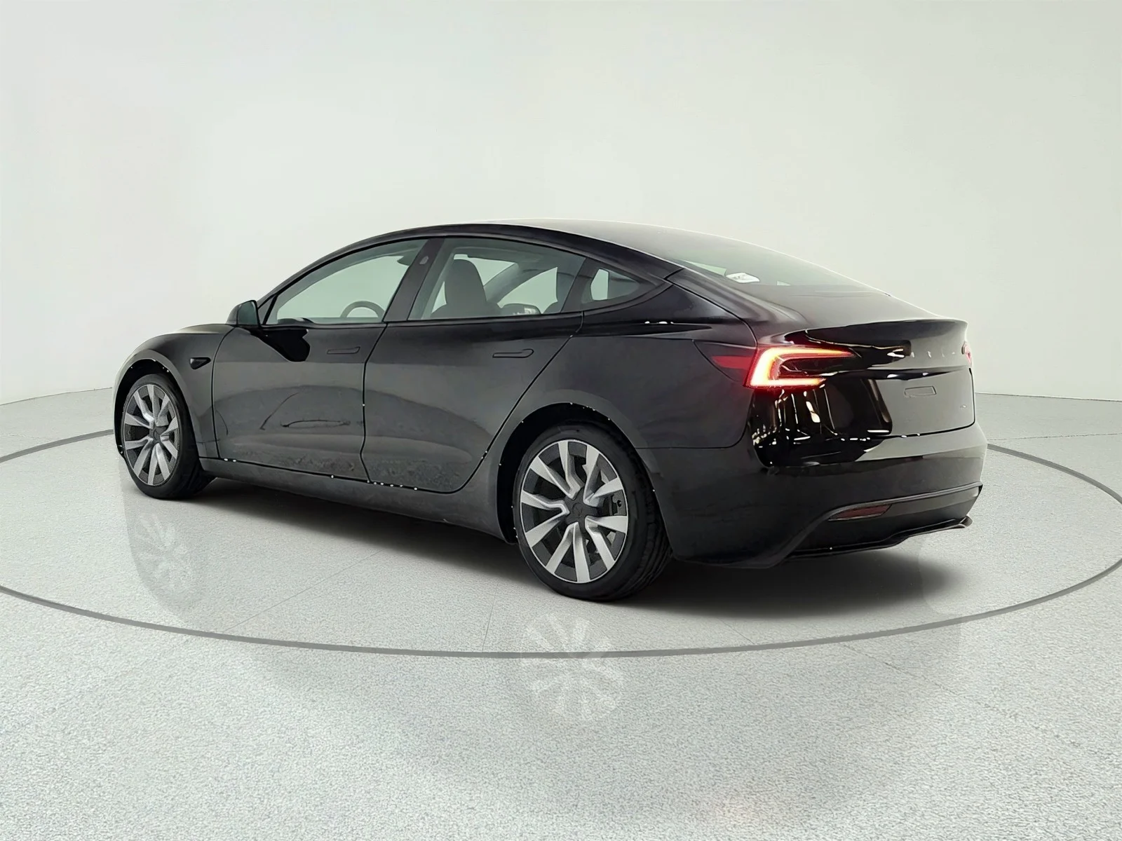Used 2024 Solid Black Tesla Long Range image 7