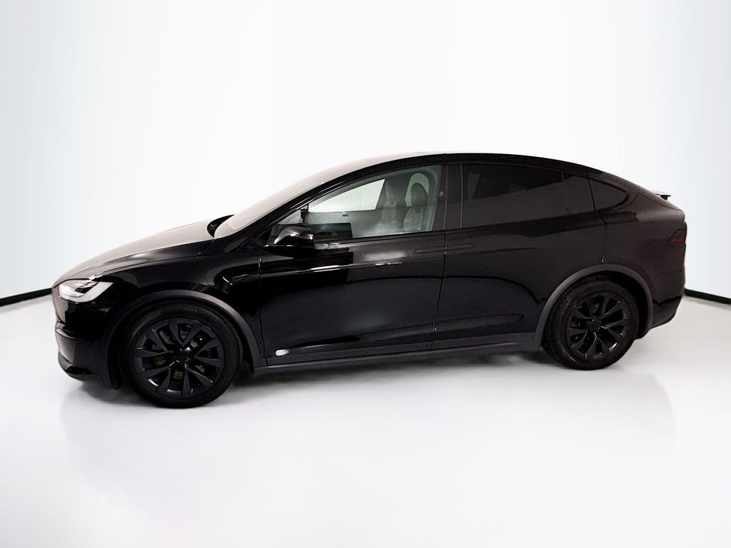 Used 2023 Solid Black Tesla  image 8