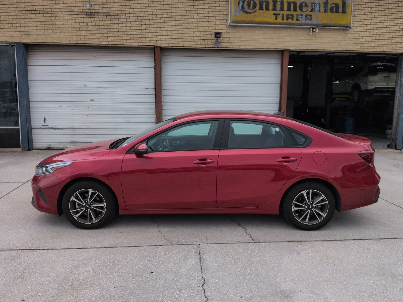 Certified Used 2023 Currant Red Kia LXS image 7