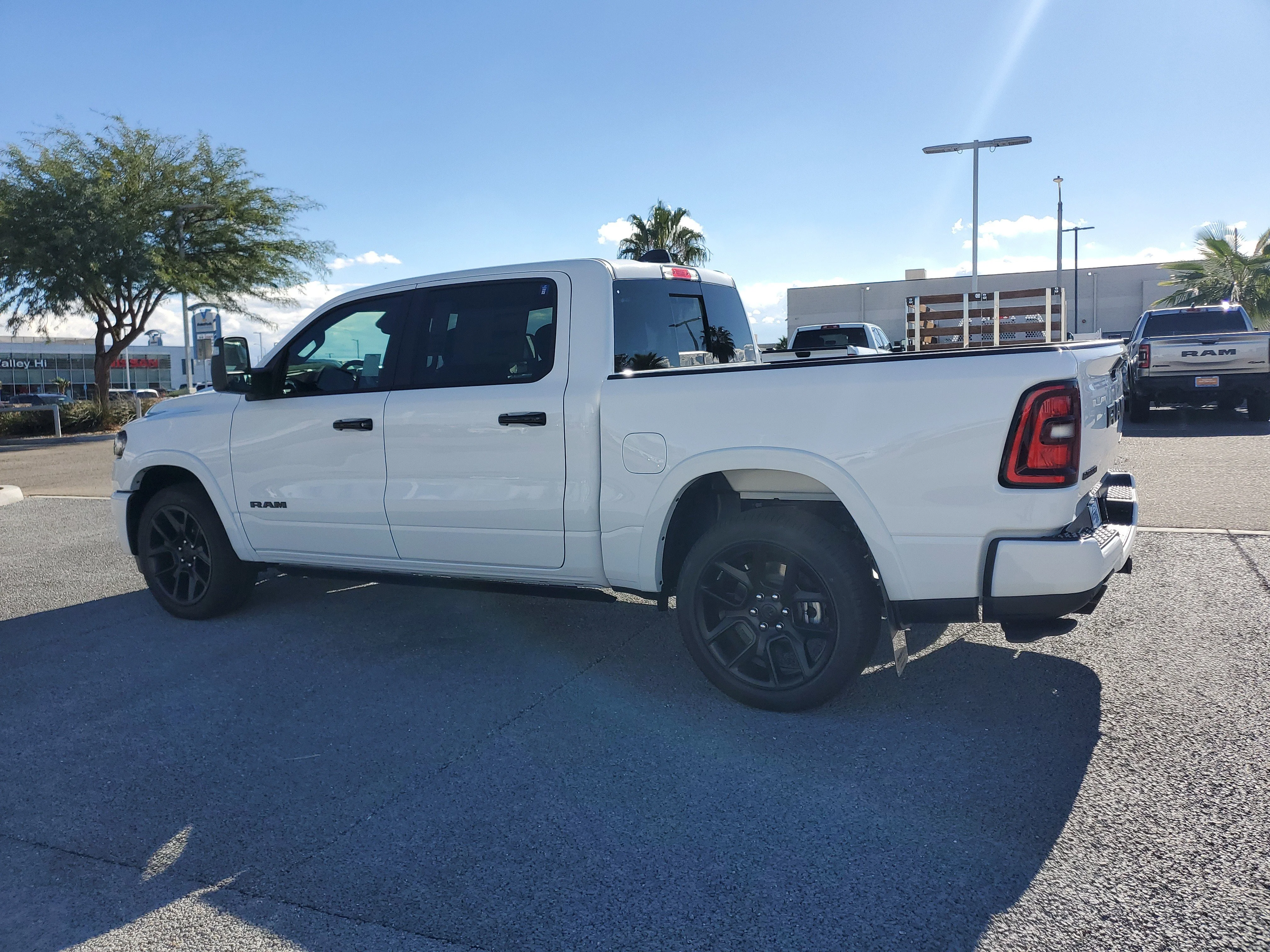 New 2026 Bright White Clear-Coat Exterior Paint RAM Laramie image 3