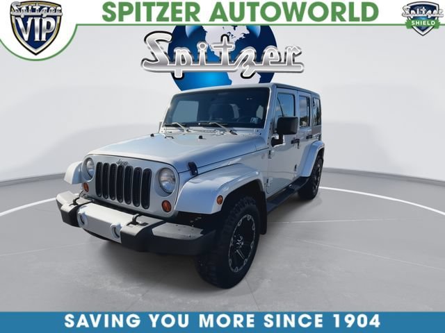 Used 2011 Silver Jeep Sahara image 4