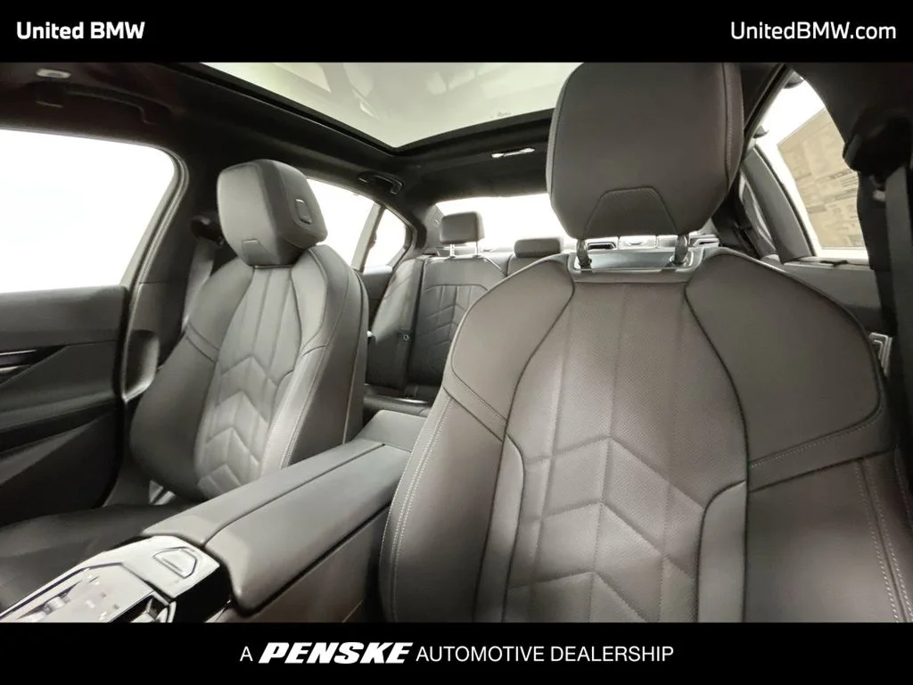 2026 BMW 5 Series 550e - Photo 13