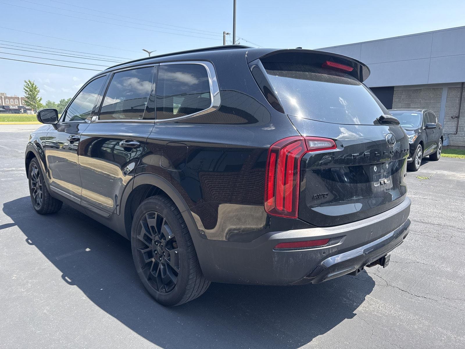 Used 2021 Ebony Black Kia EX image 4