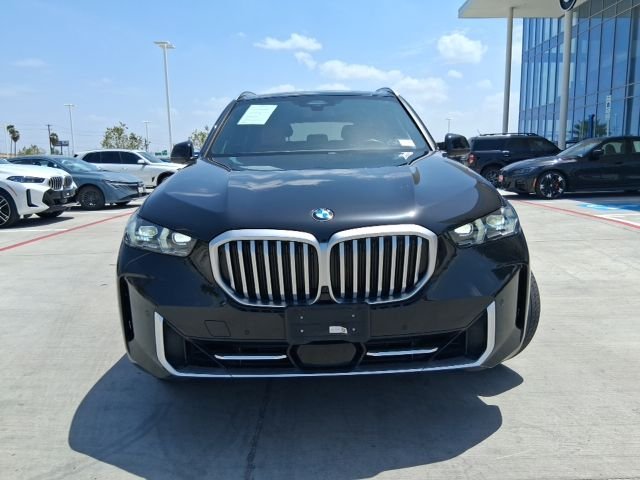Used 2024 Black BMW sDrive40i image 2
