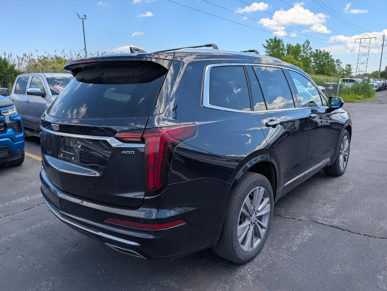 Used 2022 Dark Moon Blue Metallic Cadillac Premium Luxury image 7