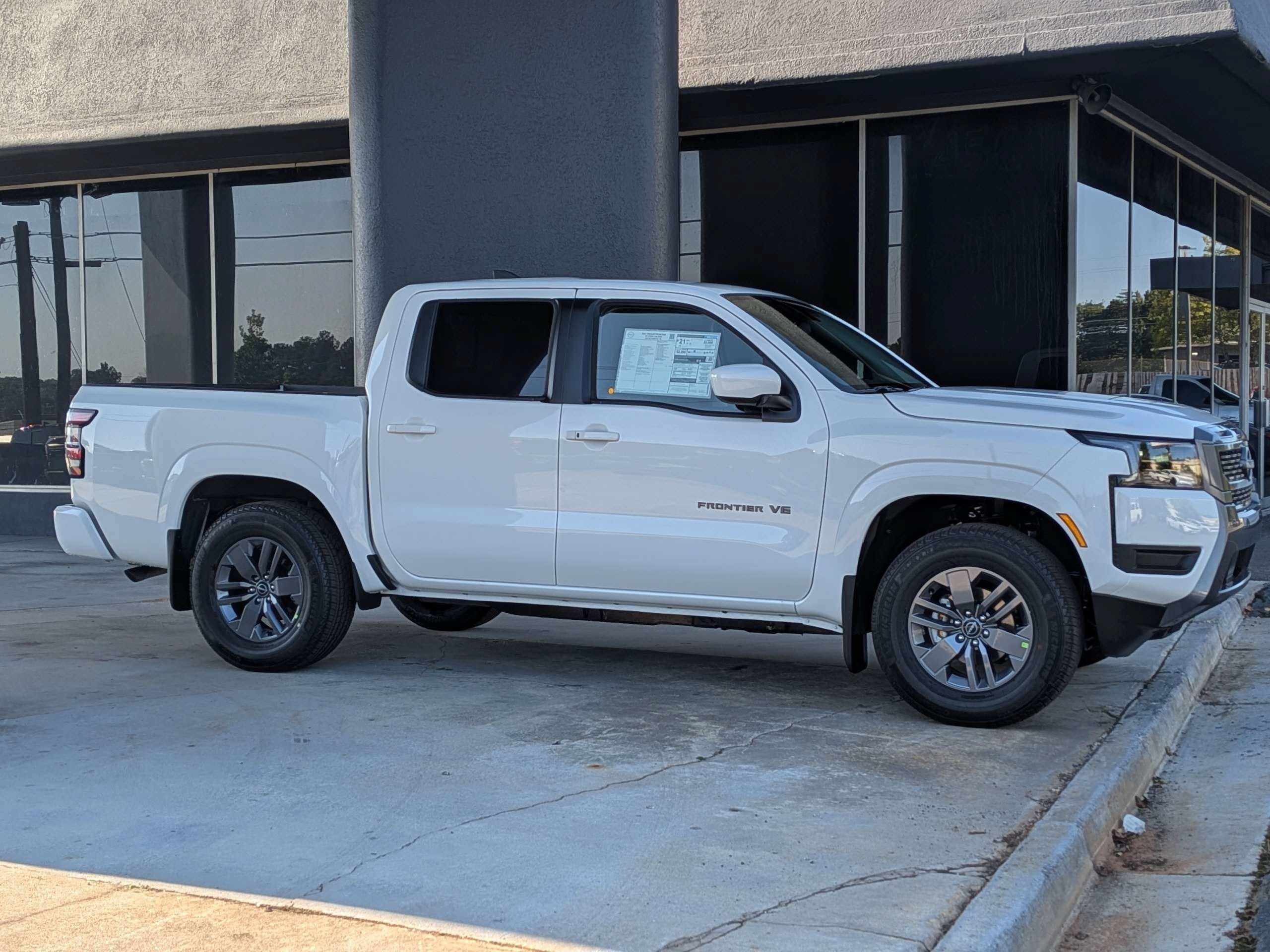 New 2027 Glacier White Nissan Crew Cab SV image 1