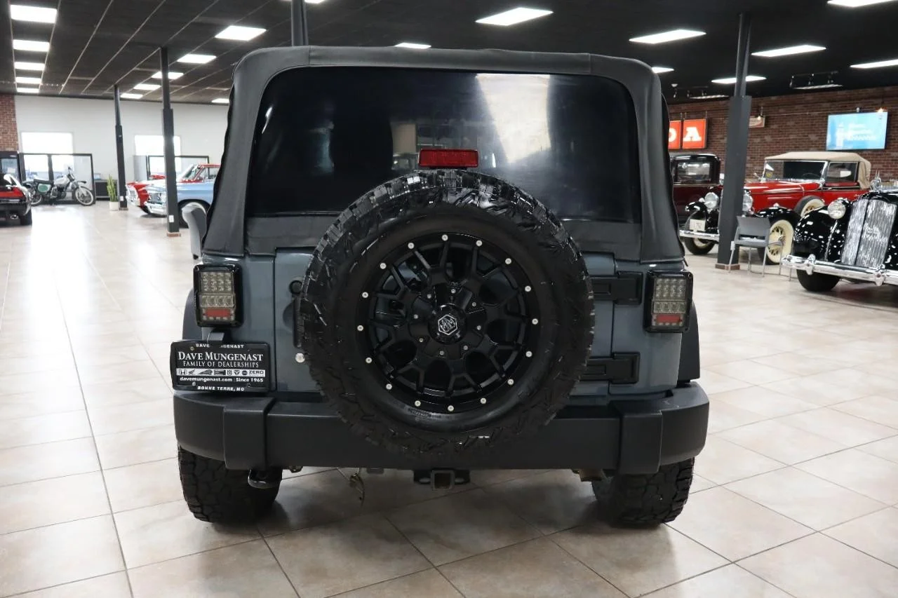 Used 2015 Hydro Blue Pearl Coat Jeep Sport image 2