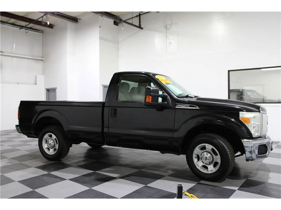 Used 2015 Black Ford XLT Pickup 2D 8 ft image 1