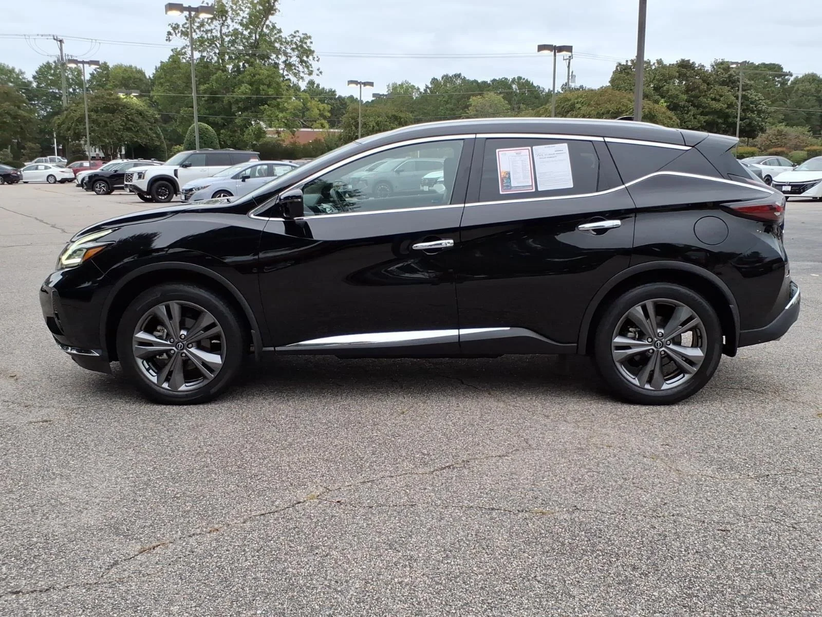 Used 2023 Super Black Nissan Platinum image 3