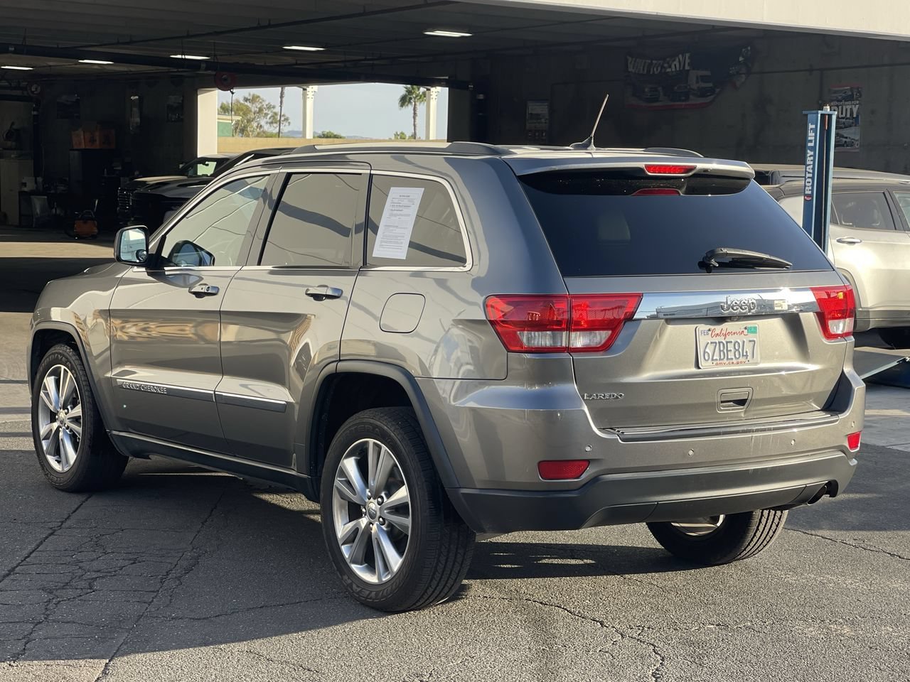 Used 2013 Mineral Gray Metallic Jeep Laredo image 3