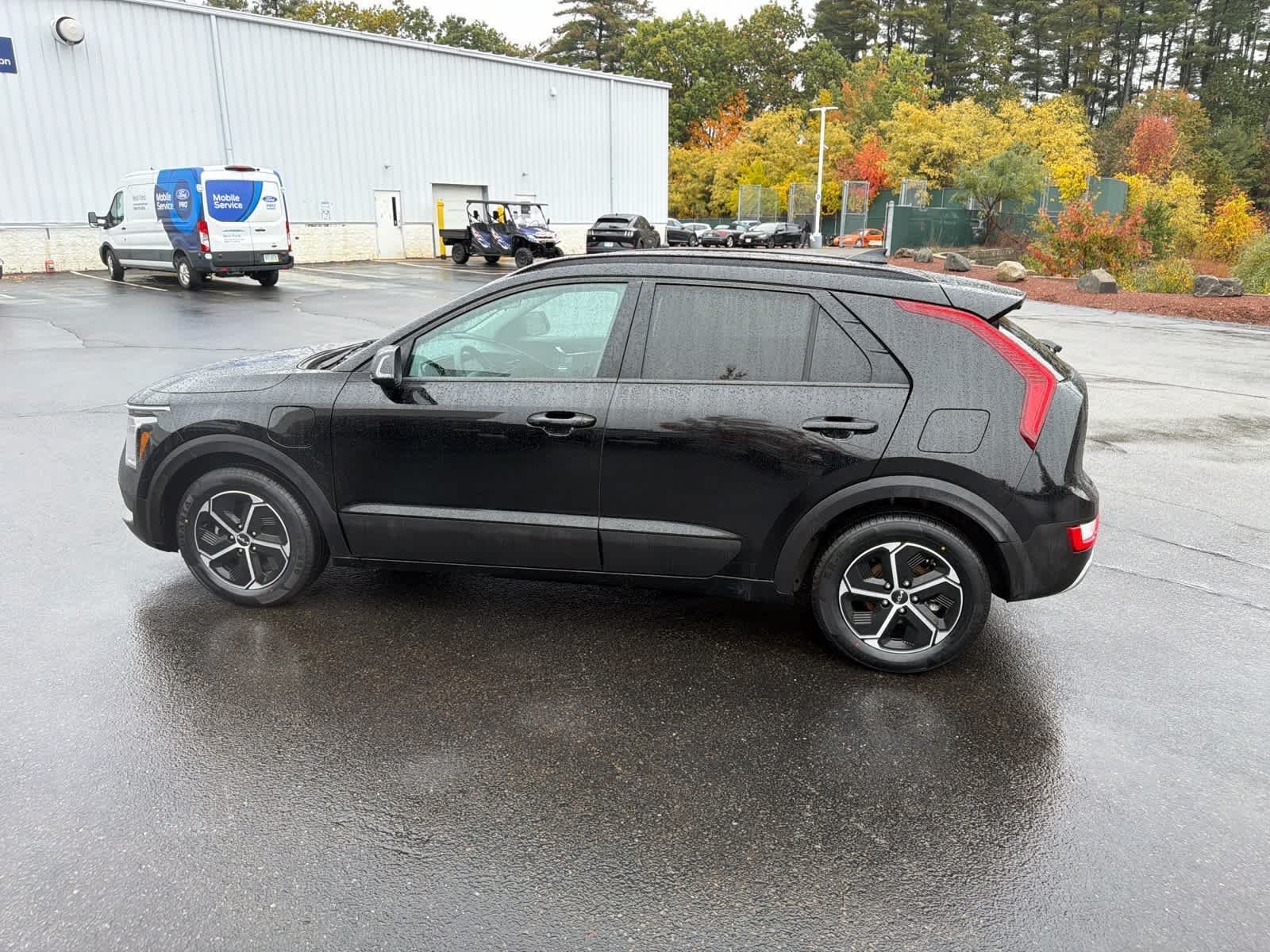 Used 2025 Aurora Black Pearl Kia EX image 12