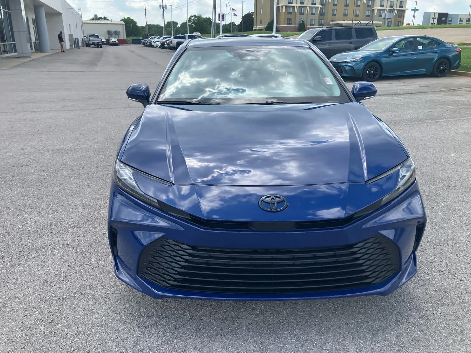 Used 2025 Reservoir Blue Toyota LE image 2