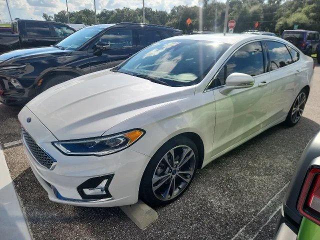 Used 2019 White Ford Titanium image 1