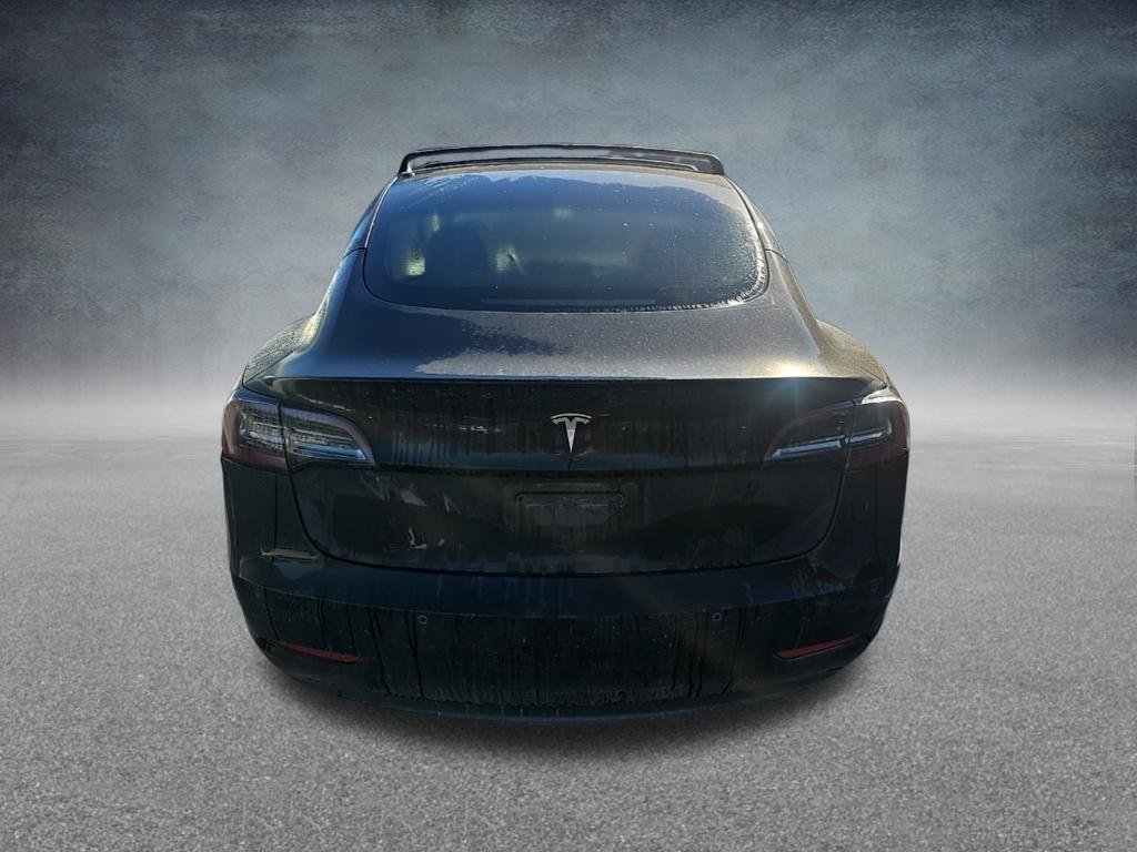 Used 2021 Solid Black Tesla Standard Range Plus image 6