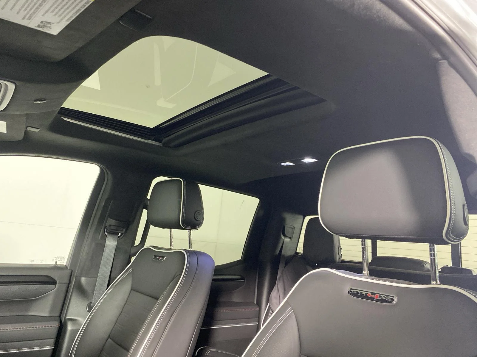 Used 2024 Sterling Metallic GMC AT4X image 2