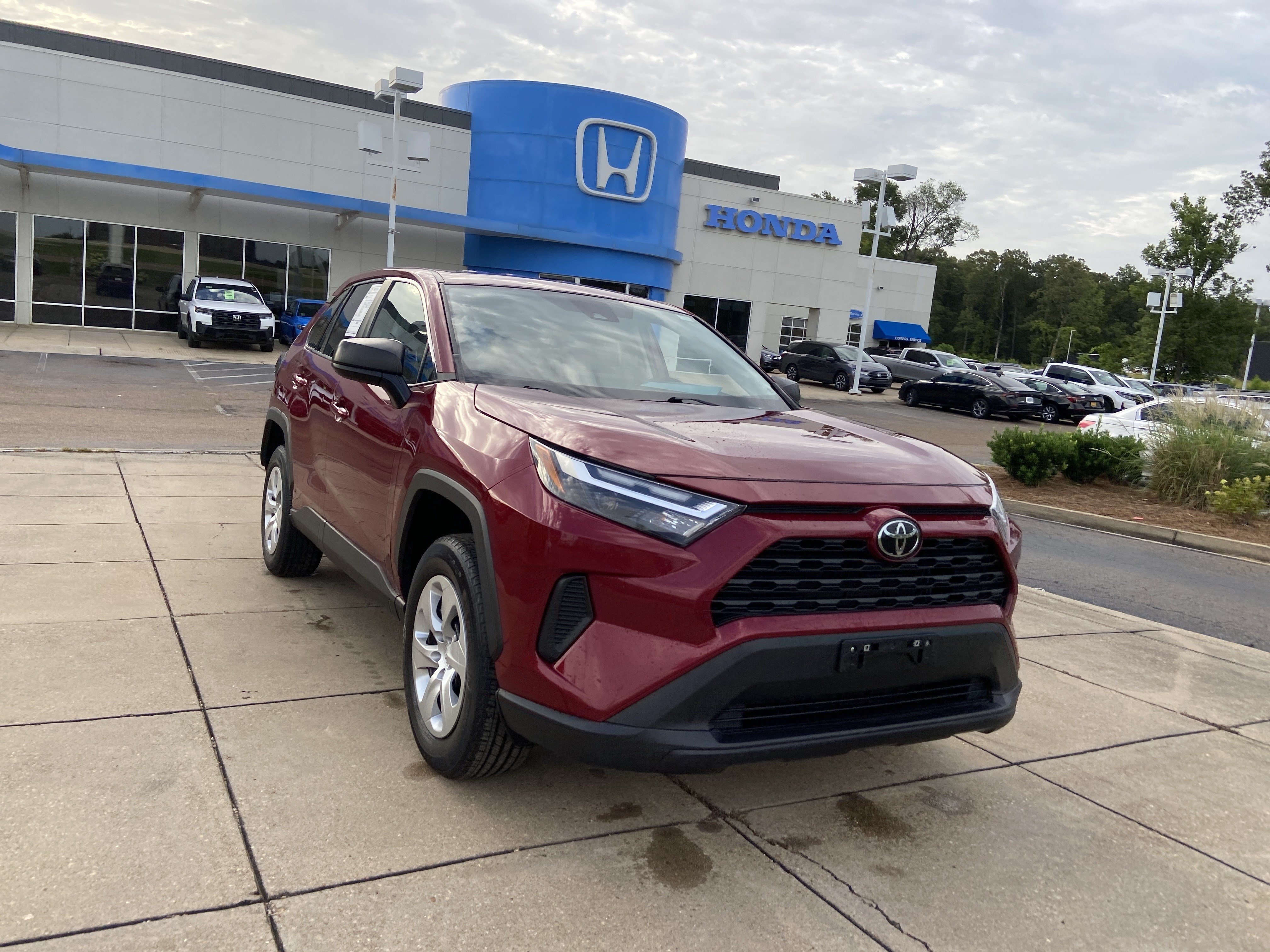 Used 2023 Ruby Flare Pearl Toyota LE image 2