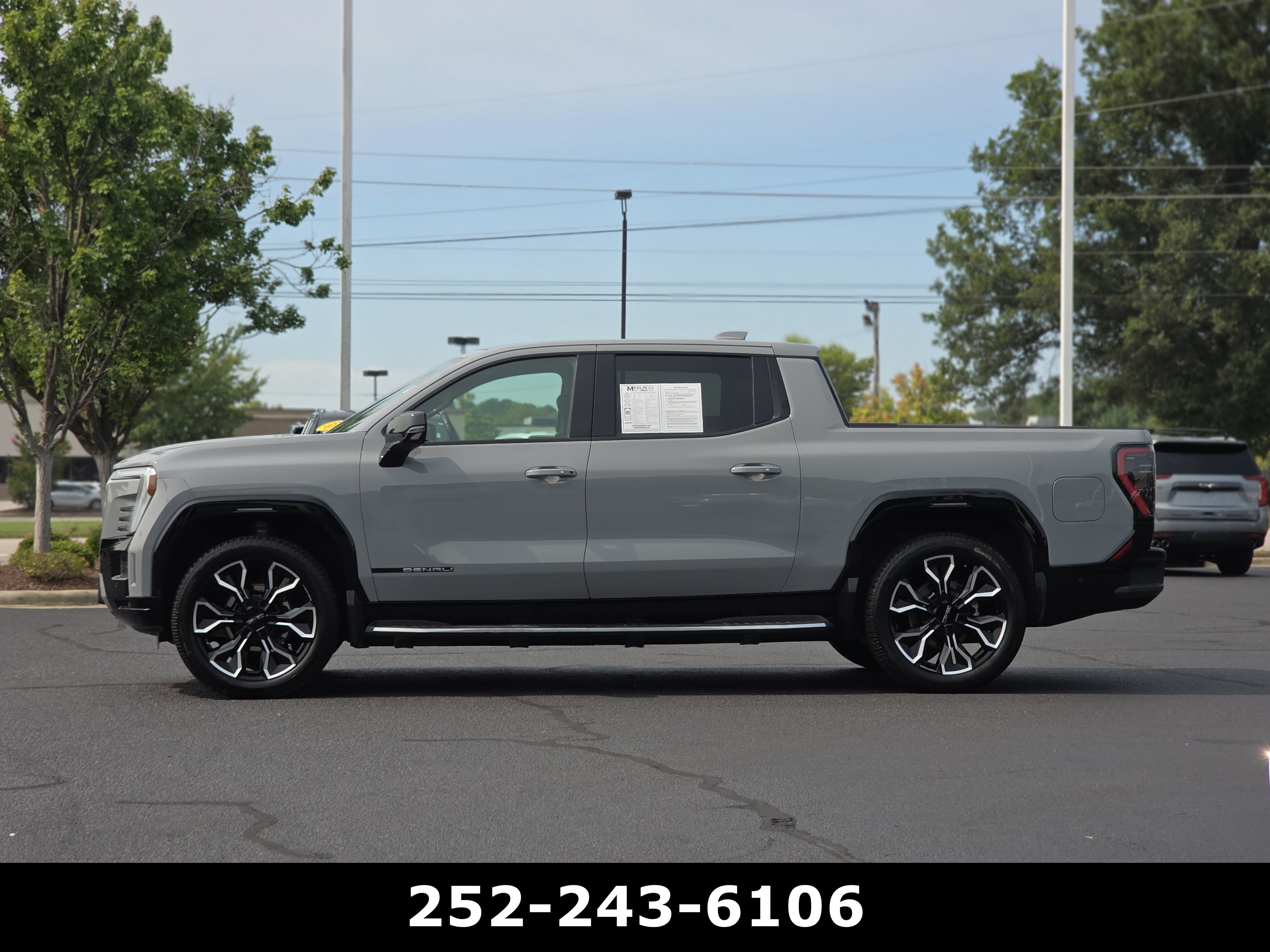 Used 2025 Thunderstorm Gray GMC Max Range Denali image 4