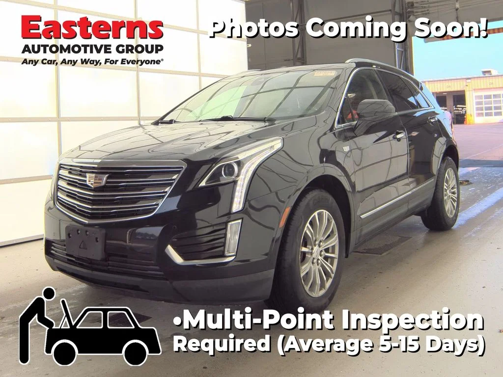 Used 2018 Black Cadillac Luxury image 1