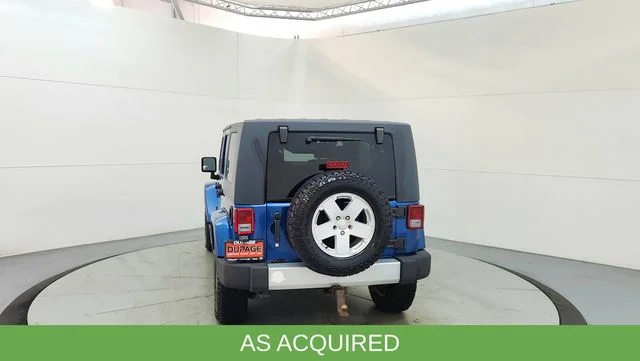 Used 2010 Blue Jeep Unlimited Sahara image 8