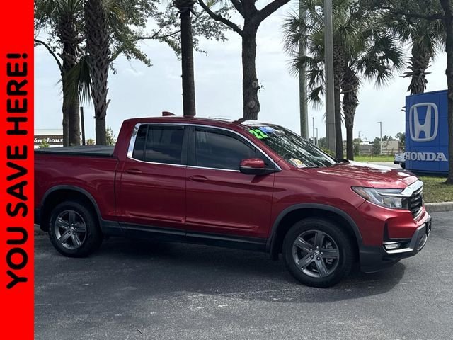 Certified Used 2022 Radiant Red Metallic II Honda AWD RTL image 1