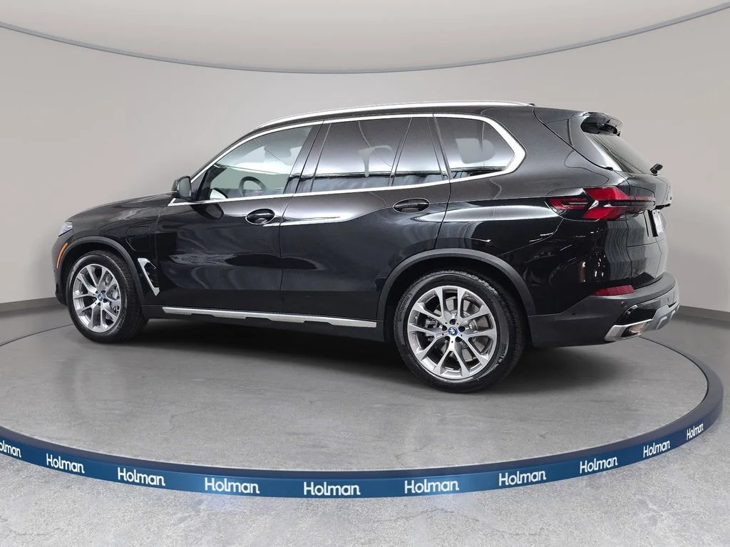 Used 2025 Black Sapphire Metallic BMW xDrive50e image 8