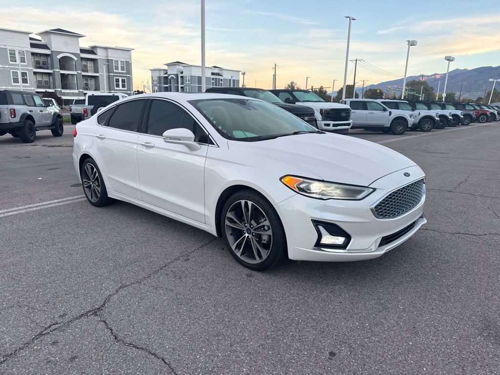 Used 2019 White Platinum Clearcoat Metallic Ford Titanium image 1