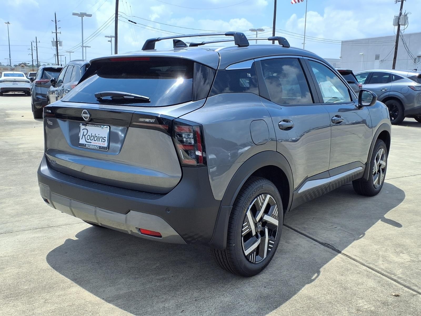 New 2026 Gun Metallic Nissan SV image 2