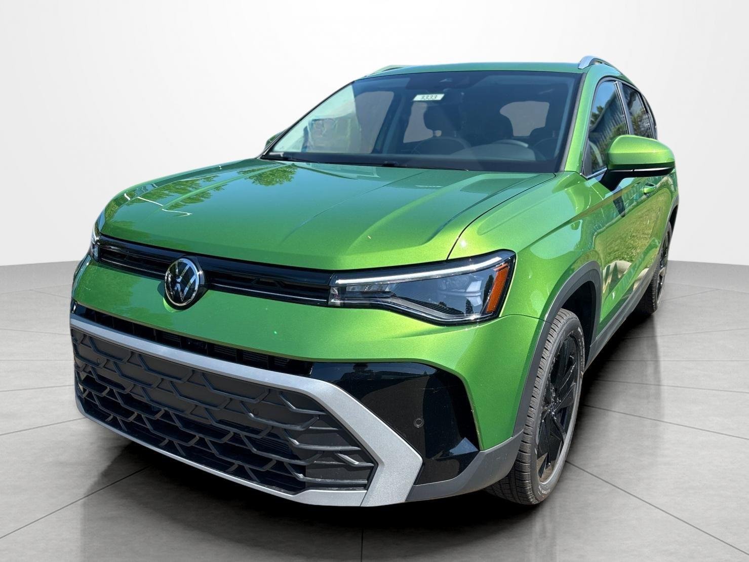 New 2026 Bright Moss Green Metallic Volkswagen SE image 1