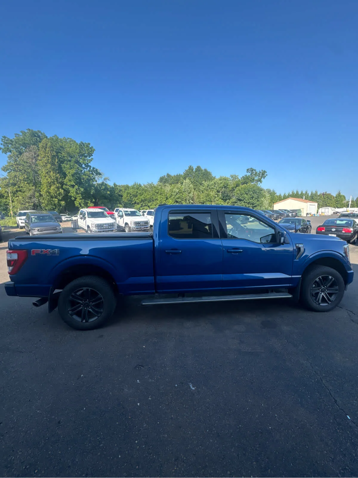 Used 2022 Atlas Blue Metallic Ford LARIAT image 2
