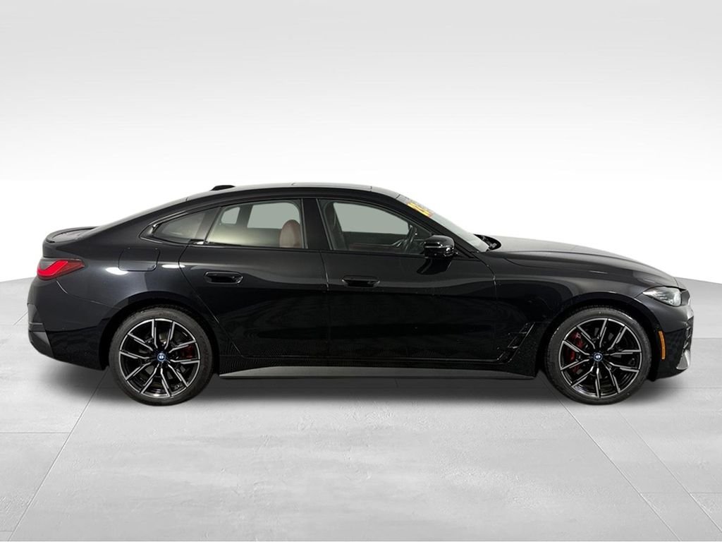 Used 2023 Black Sapphire Metallic BMW eDrive40 image 5