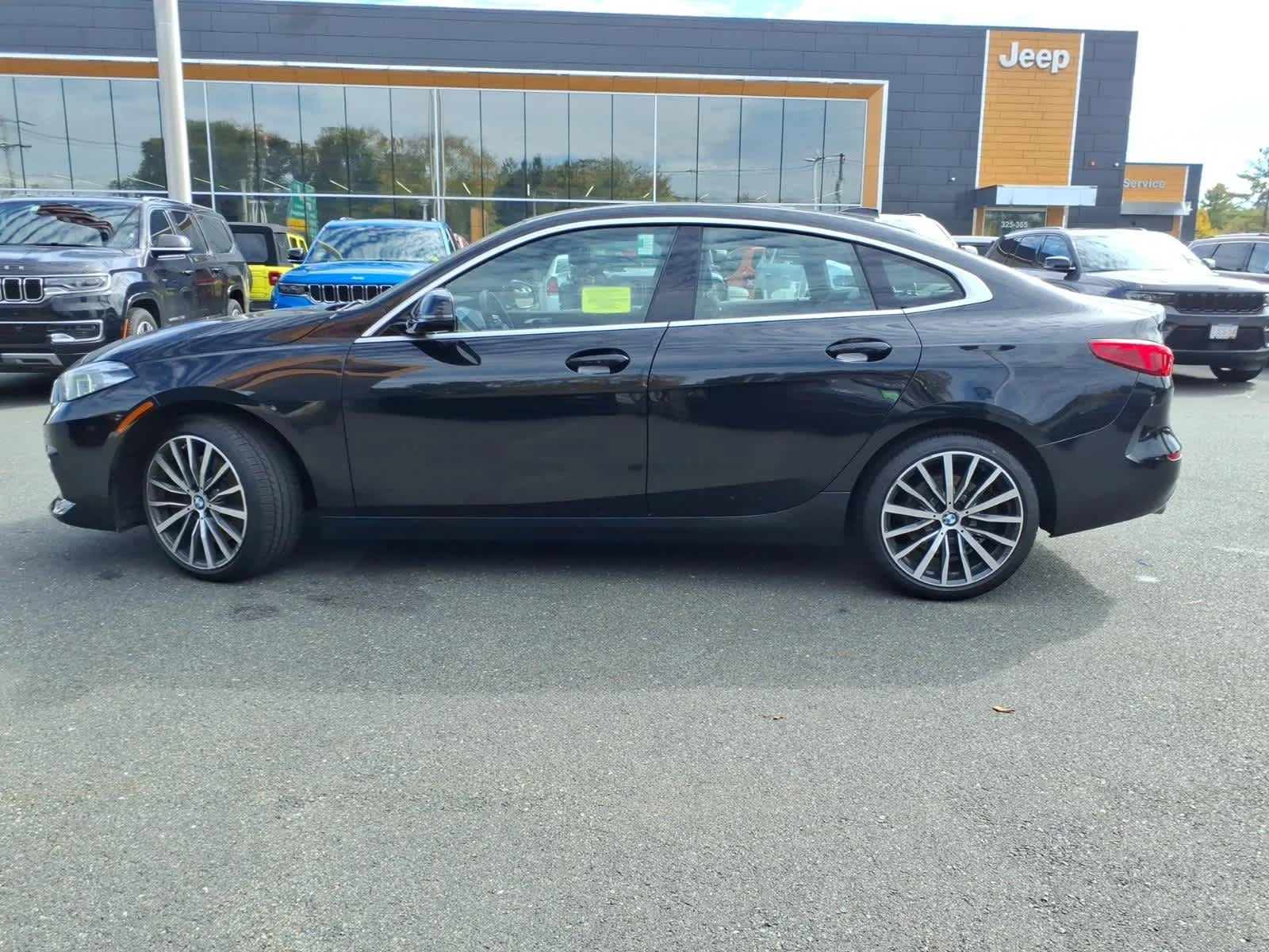 Certified Used 2021 Black Sapphire Metallic BMW 228i xDrive image 12