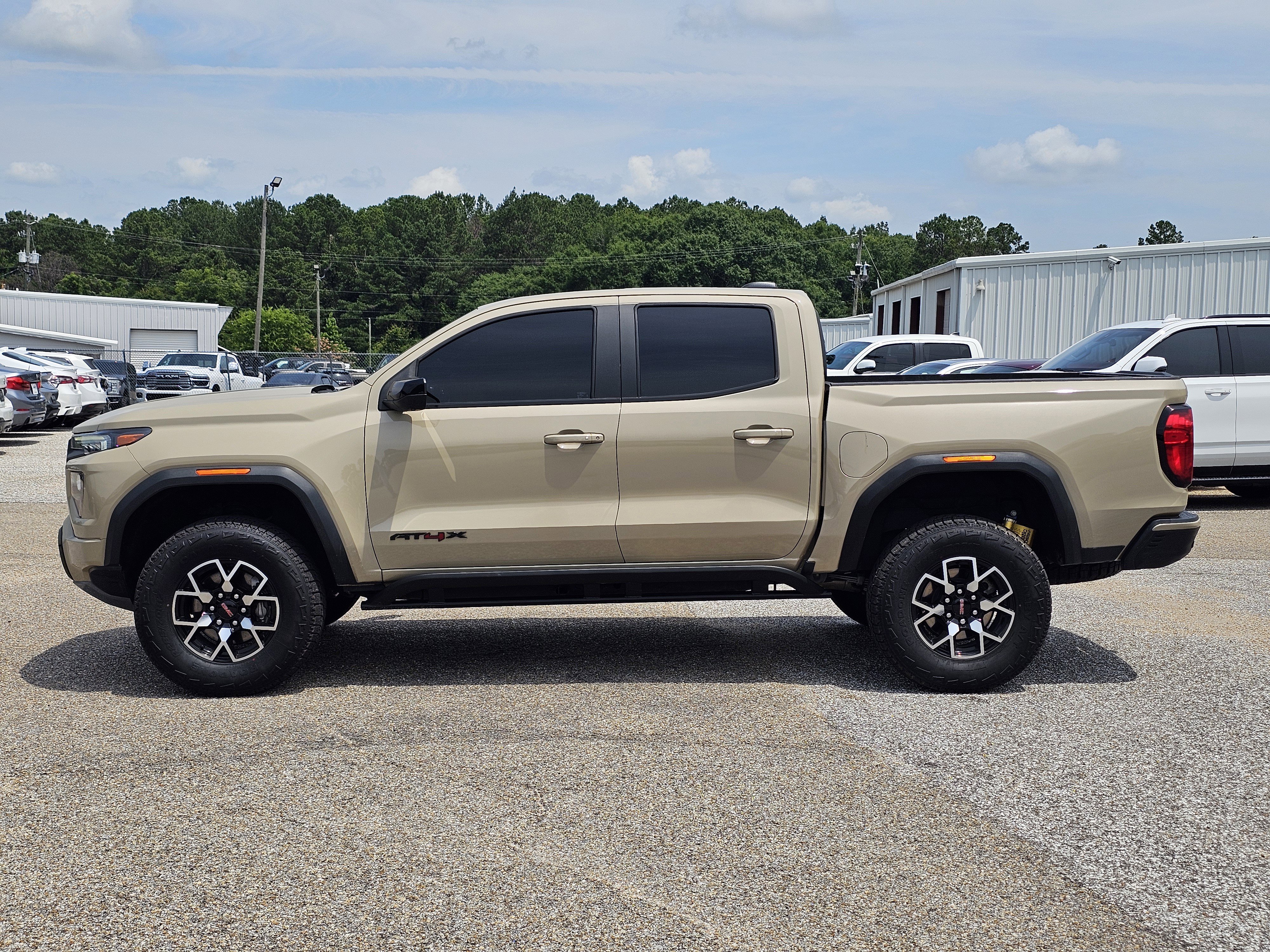 Used 2023 Desert Sand Metallic GMC 4WD AT4X image 13