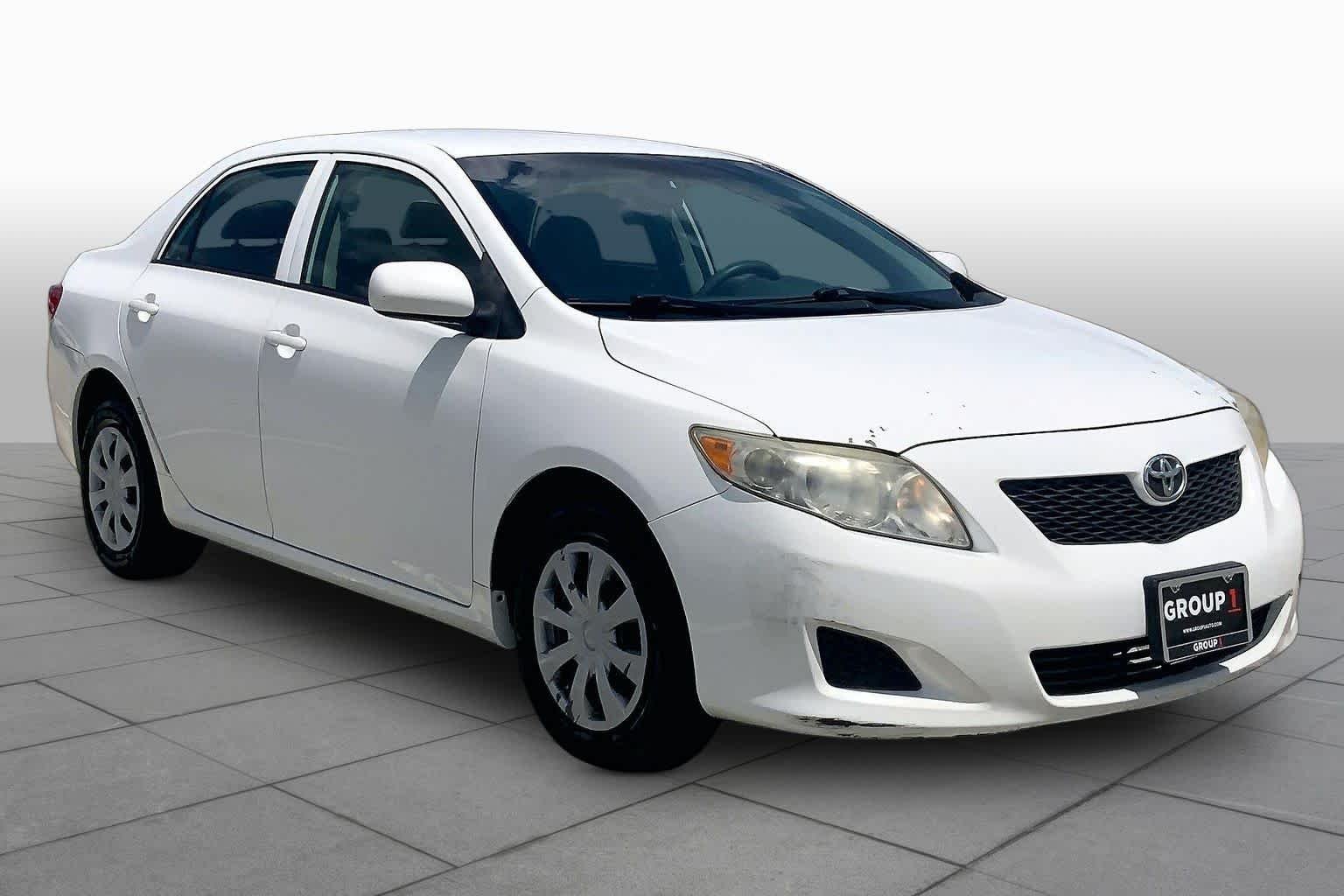 Used 2010 Super White Toyota LE image 2
