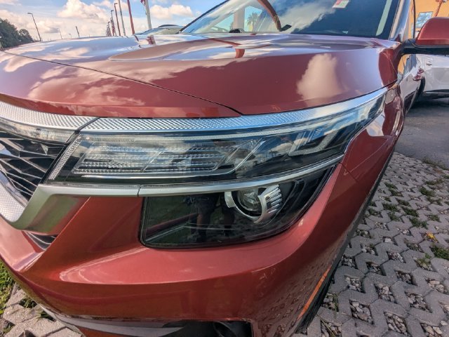 Certified Used 2023 Orange Kia S image 9
