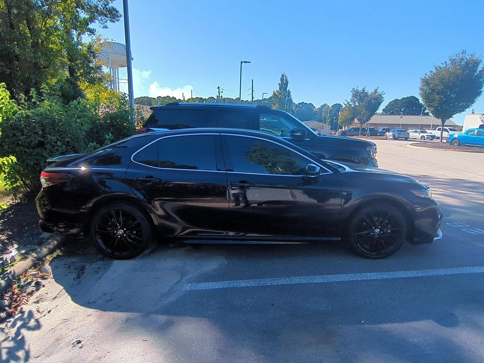 Used 2023 Midnight Black Metallic Toyota XSE image 4