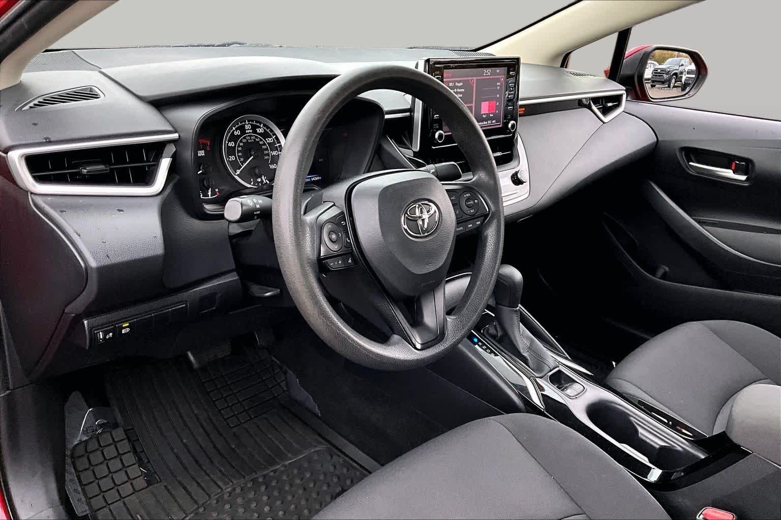 Used 2020 Barcelona Red Metallic Toyota LE image 17