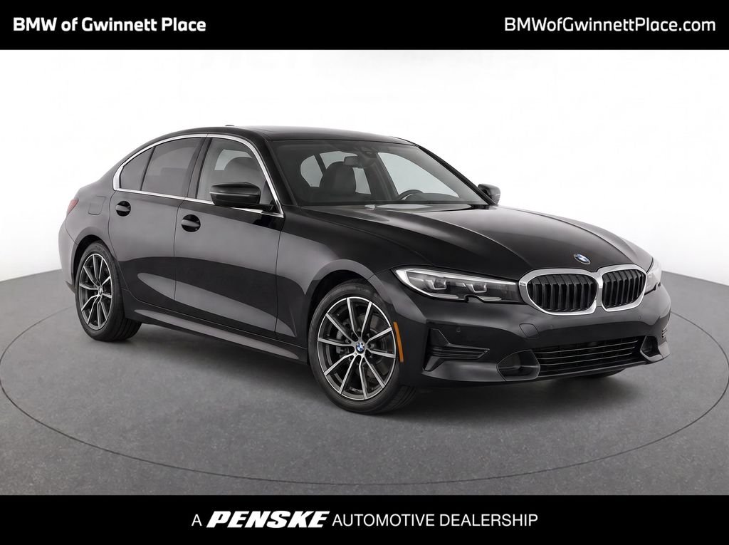 Used 2021 Jet Black BMW 330i image 1