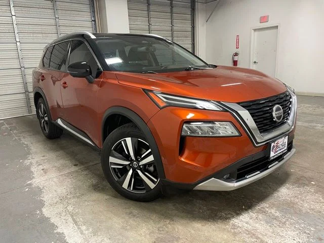 Used 2021 Orange Nissan Platinum image 1