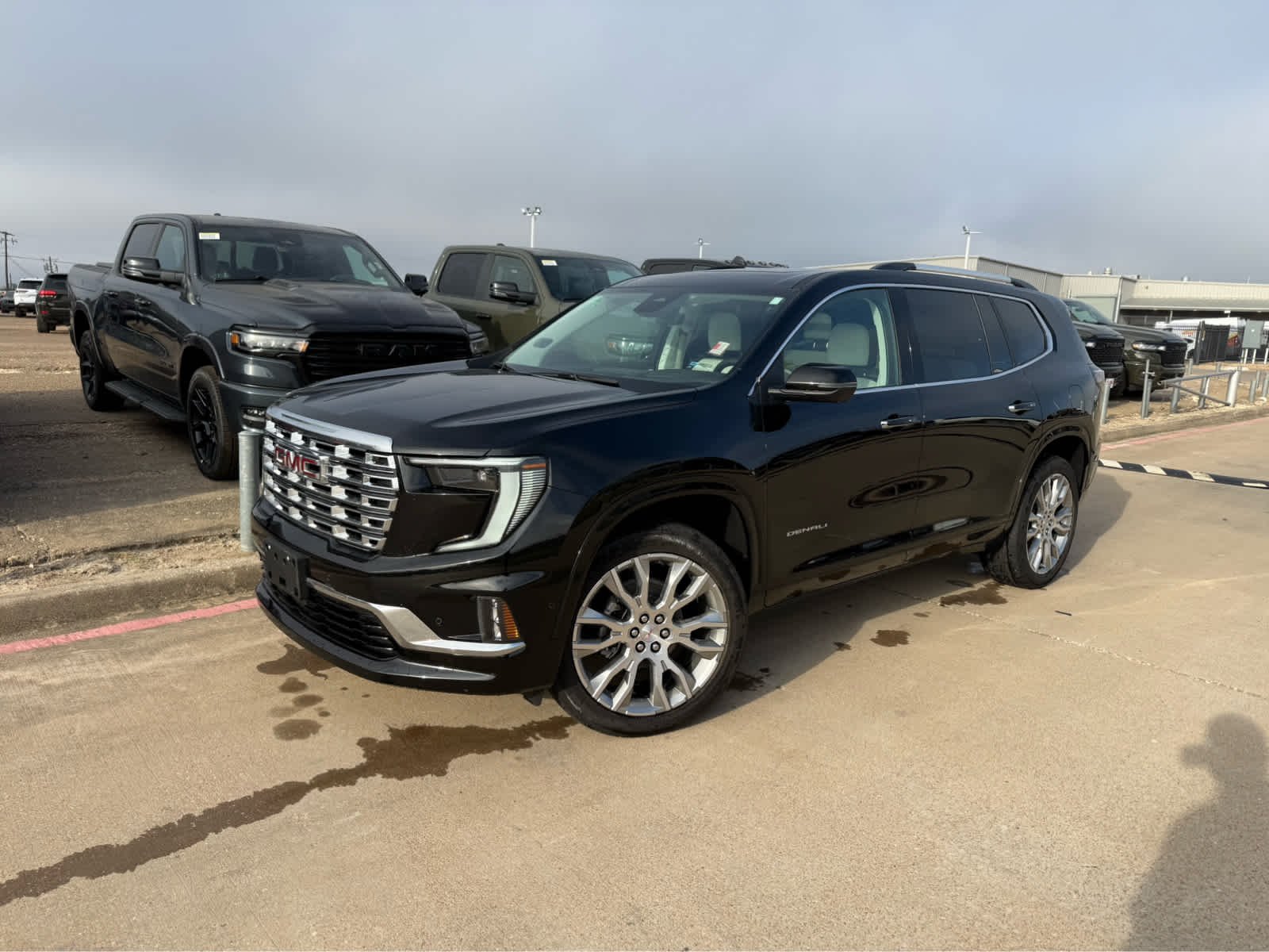 Used 2025 Ebony Twilight Metallic GMC FWD Denali image 2
