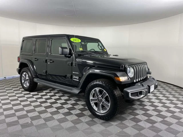 Used 2022 Black Jeep Unlimited Sahara image 1