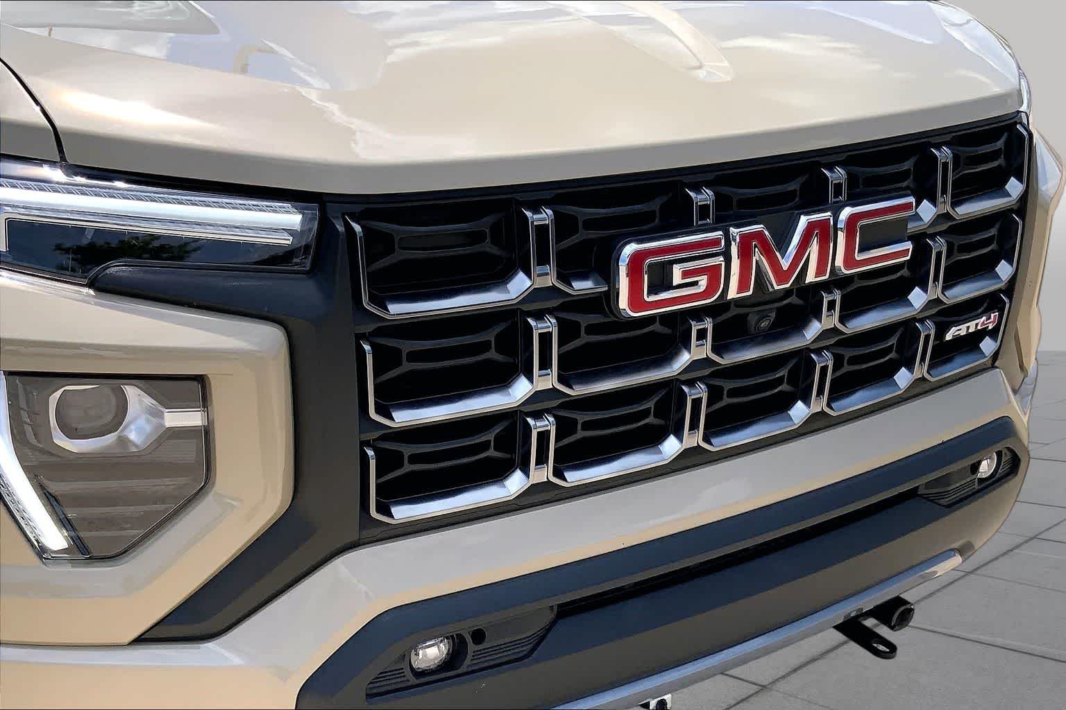 Used 2024 Desert Sand Metallic GMC 4WD AT4 image 29