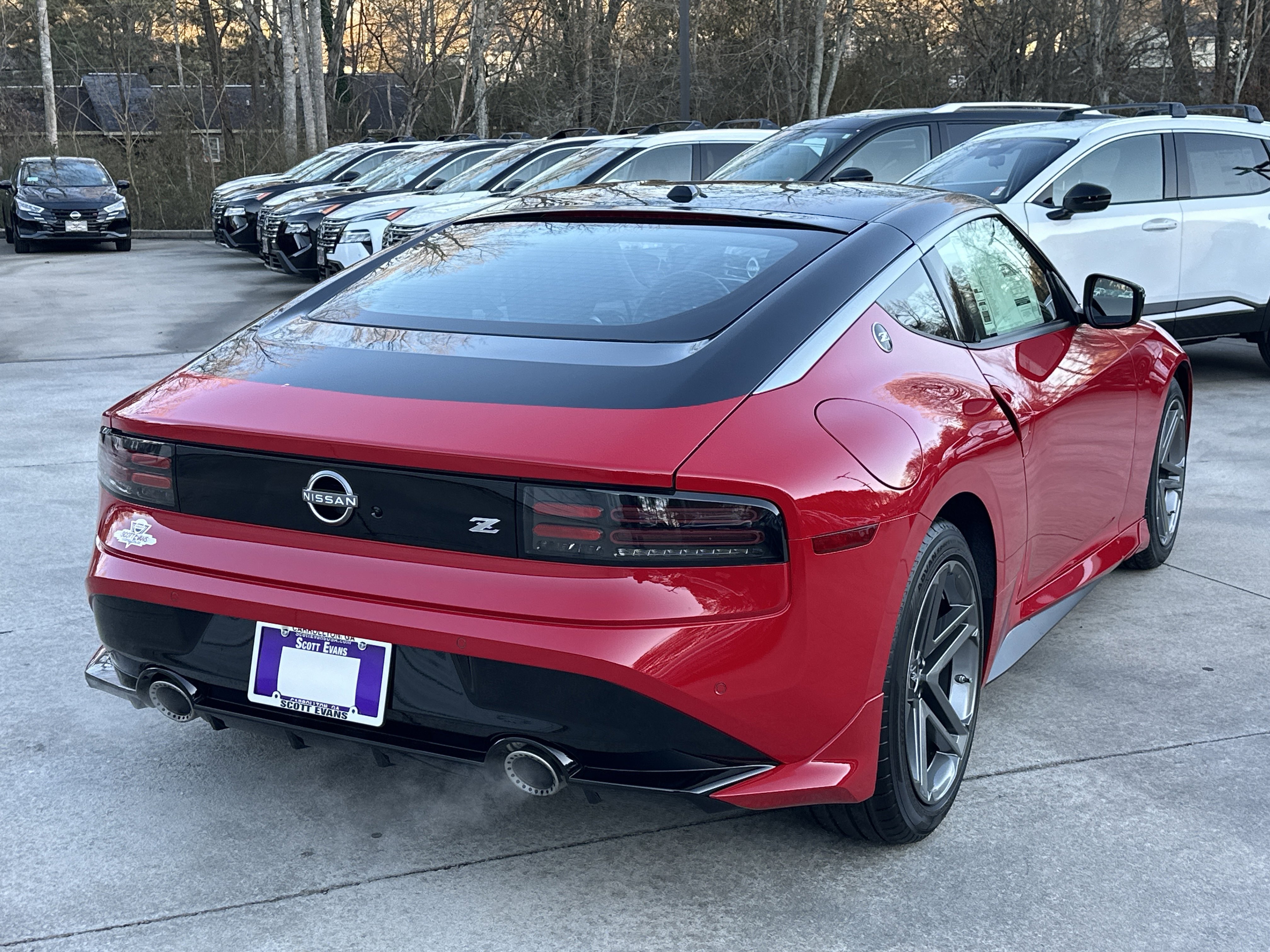 New 2026 Solid Red/Super Black Nissan Sport image 8