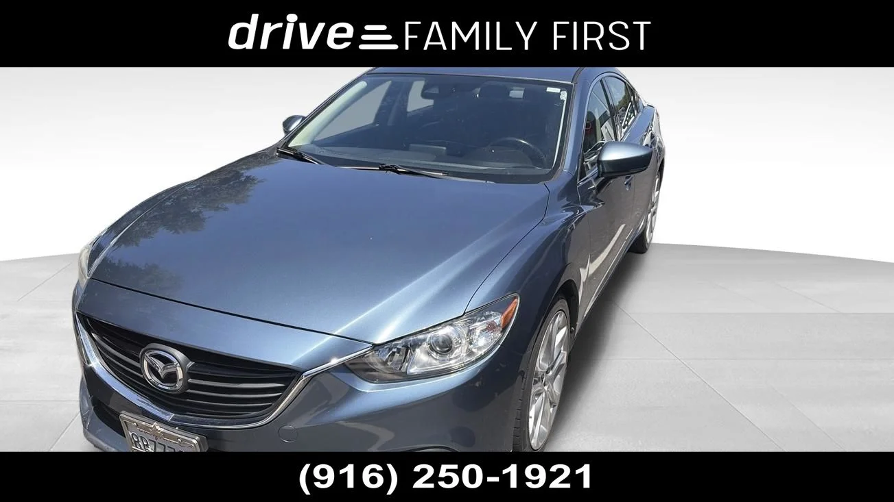 Used 2017 Blue Reflex Mica Mazda Touring image 1