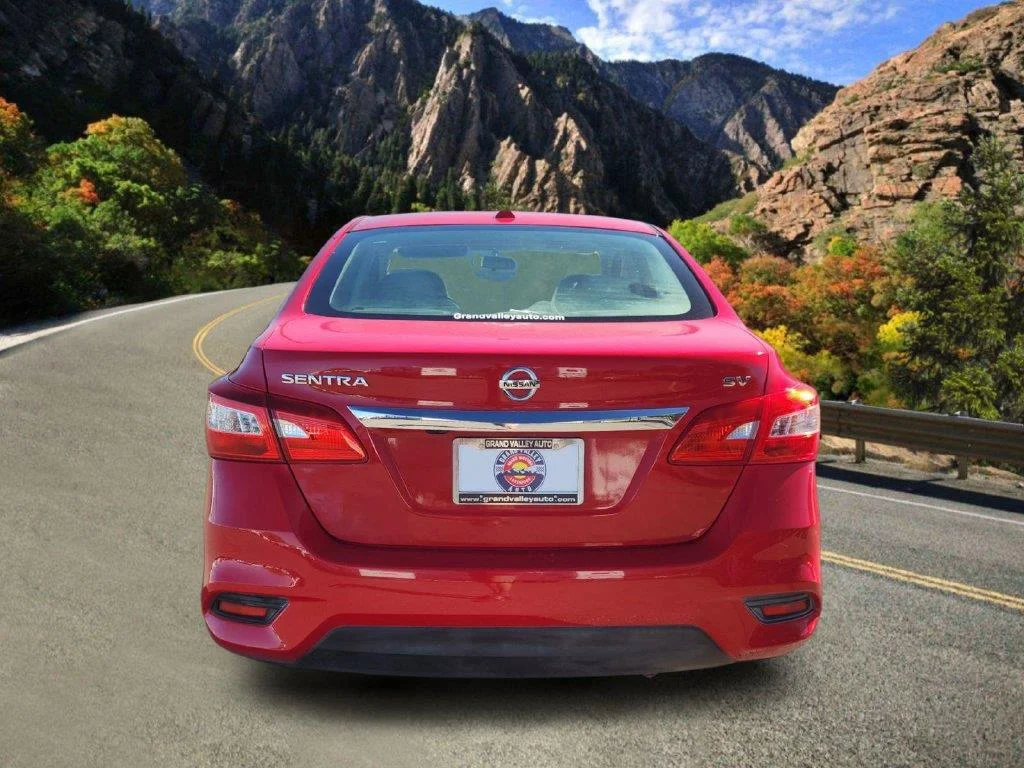 Used 2017 Red Alert Nissan SV image 4