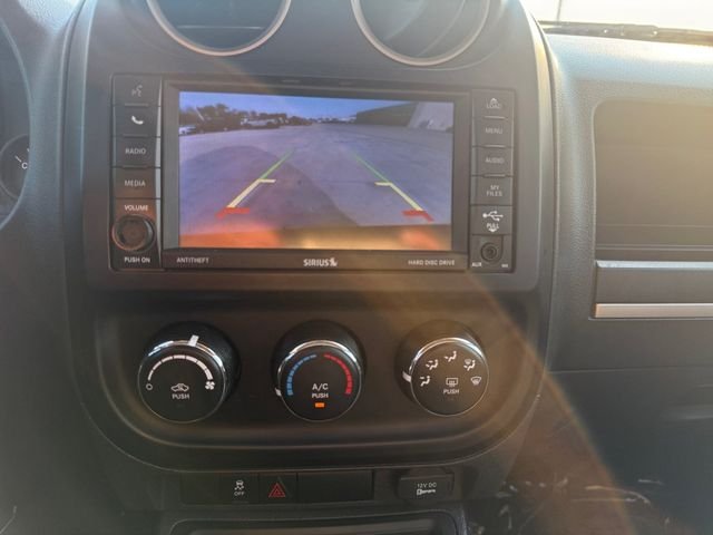Used 2016 Granite Crystal Clearcoat Metallic Jeep Sport image 12