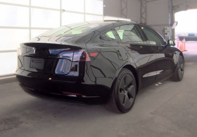 Used 2023 Solid Black Tesla Base image 2