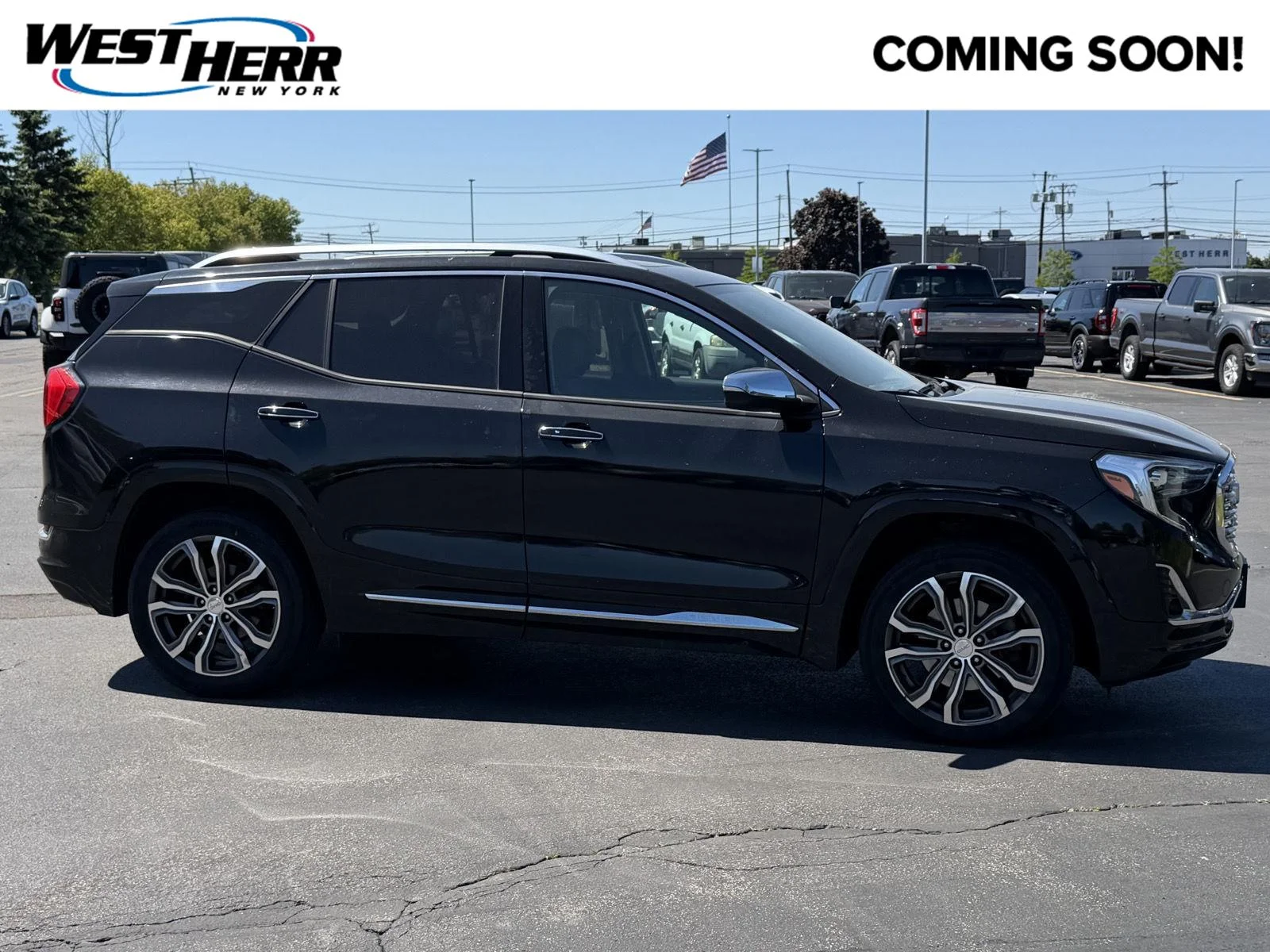 Used 2019 Ebony Twilight Metallic GMC Denali image 1